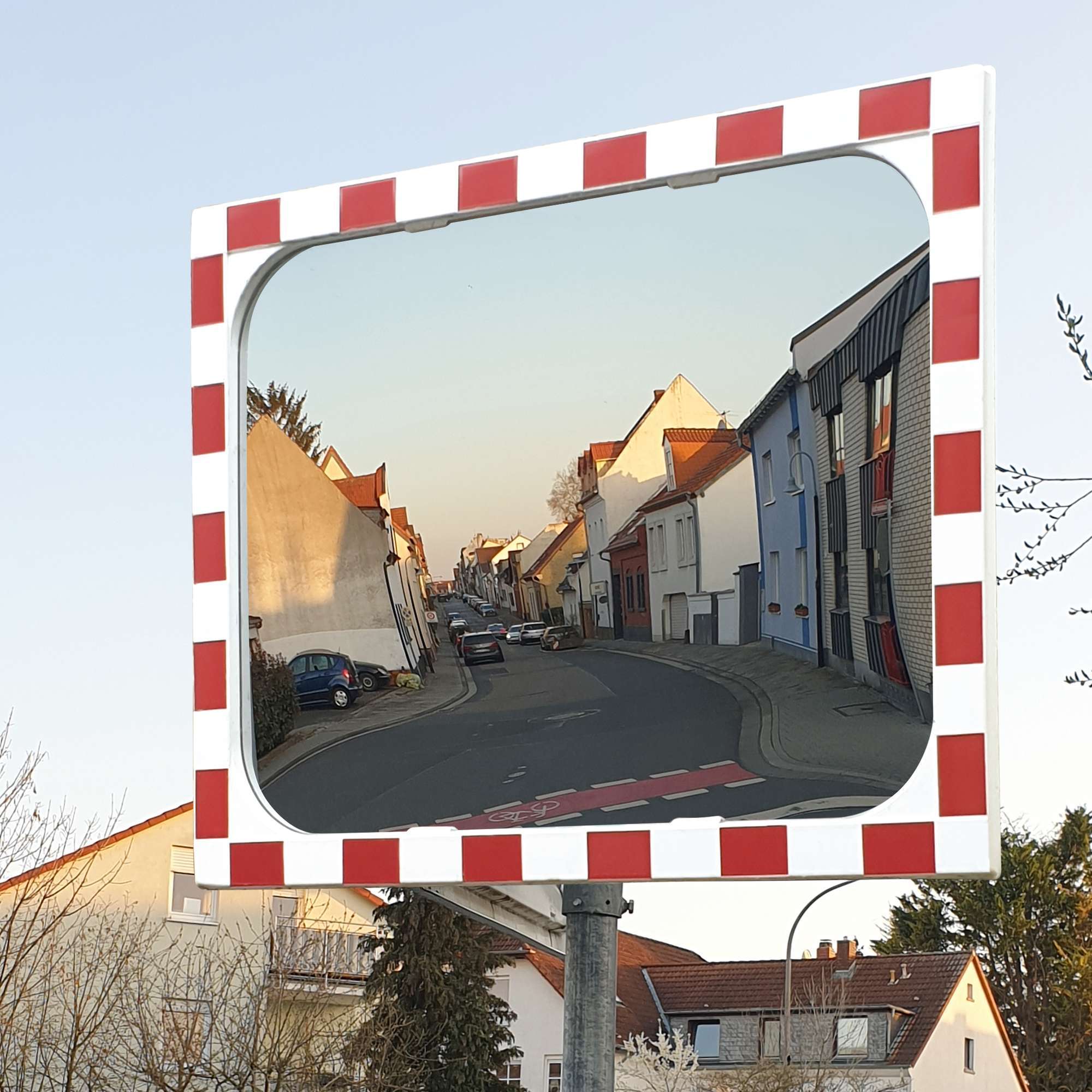 Glass convex mirror on public street