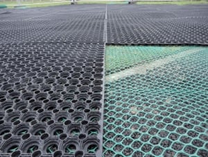 USING GRASS MATS TO REDUCE GREEN SPACE SLIPS AND FALLS