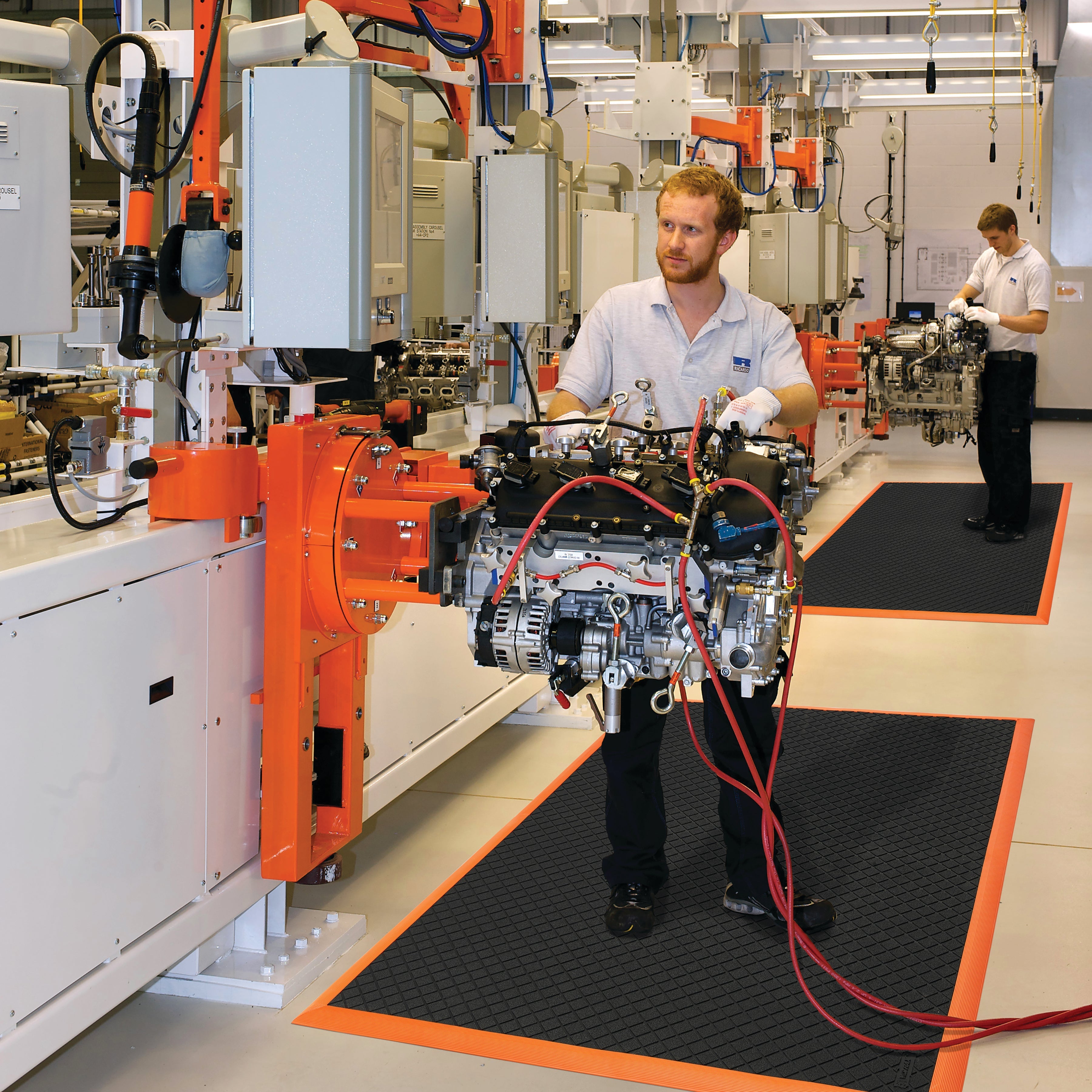 Safety Stance Solid™ Anti-Fatigue Mat At Workstation